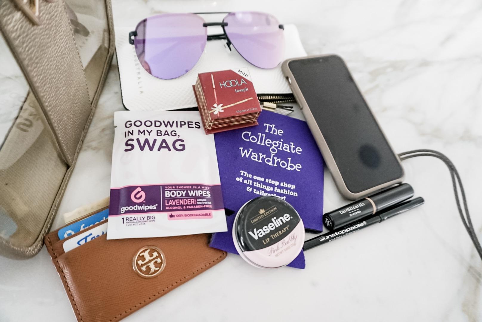 GameDay Bag Prep - The Collegiate Wardrobe koozie, Quay Sungalsses, Deodorant Wipes, with make up necessities